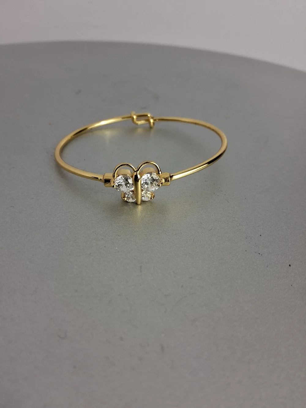 Gold-Tone Metal Baby Bangle Bracelet W/4 White Crystal Accents Adjustable